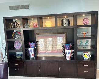 Gorgeous Gorman's Lighted Display Shown with an Incredible Assortment of Ceramic and Glass Pieces Available. 