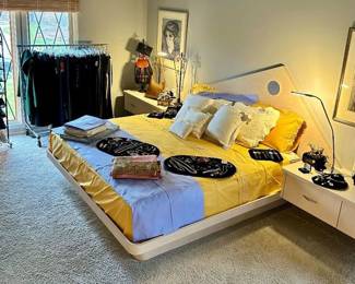 Wonderful Primary Suite Filled with Wonderful Art, Apparel, Italian Bedding and More. 