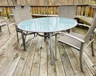Outdoor Patio Table (With Cover) and 6 Arm Chairs Upholstered in Sunbrella Fabric.
