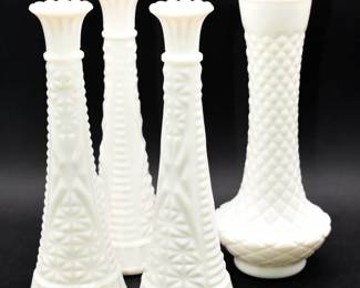 A Group of Four Anchor Hocking 'Stars and Bars' and Diamond Point Milk Glass Vases

