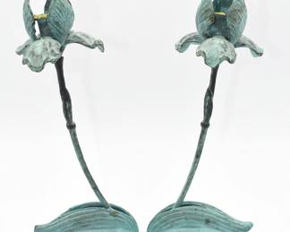 A Pair of Silvestri Patinated Bronze Iris Candlesticks
