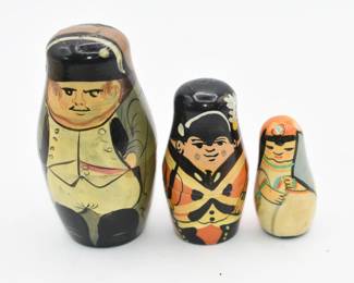 A Set of Three Vintage Hand-Painted Wooden Nesting Dolls, Military Theme
