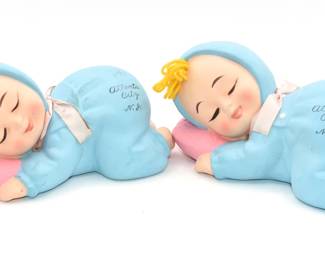 A Pair of Vintage Lego Japan Sleeping Baby Ceramic or Chalkware Coin Banks
