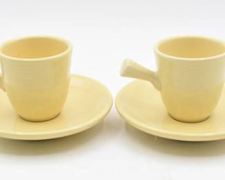 A Pair of Homer Laughlin Fiestaware Demitasse Cup and Saucer Sets, pale yellow , Stick Handle
