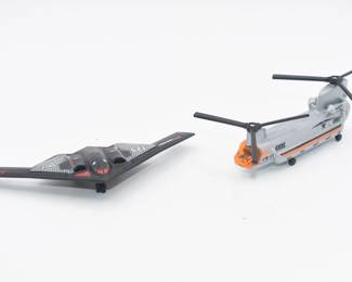 A Pair of Matchbox Sky Busters Toy Aircraft: Northrop Grumman B-2 Spirit Stealth Bomber and CH-47 Helicopter
