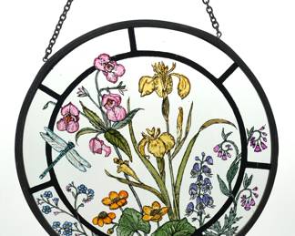 A Circular Stained Glass Suncatcher with Floral and Dragonfly Motif
