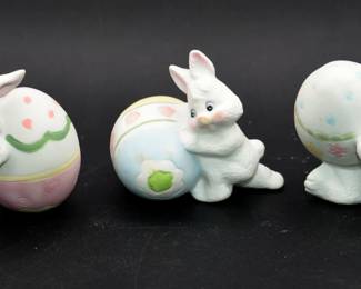 A Set of Three Vintage Ceramic Easter Bunny Figurines with Eggs
