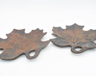 A Pair of Cast Iron Maple Leaf Decorative Trays

