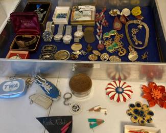 Costume jewelry, watches, pins, key chains