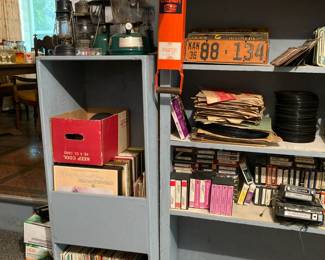 Vinyl records, 45's, 78's, albums, 8 tracks, vintage license plates (some from the 1930's)