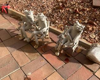 Iron frogs in chairs....yard art