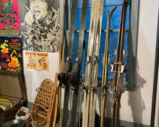 Vintage posters and vintage skis, snowshoes, ski boots
