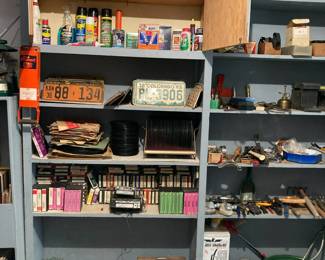 Vintage license plates, tools, household supplies