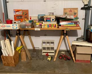 Saw horse legs, games and puzzles posters, kid's toys