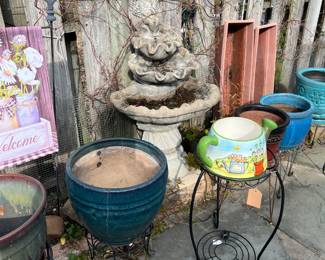 Concrete fountain, flowerpots