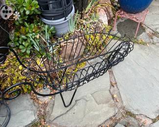 Black wrought iron cart