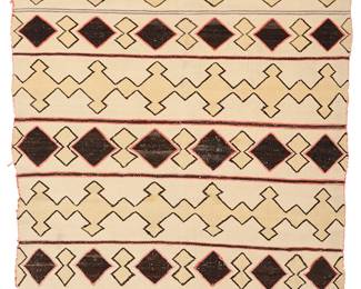 3191
A Navajo child's blanket
Late 19th/early 20th century, Diné
Woven in cream, red, yellow, brown, and blue wool with alternating geometric and striped banding
64.5" H x 42" W
Estimate: $3,000 - $5,000