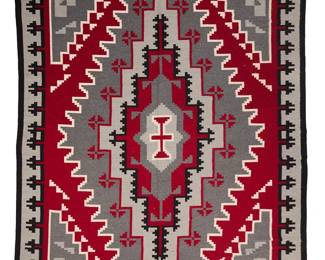 3262
A Navajo Ganado rug
Mid/late 20th century, Diné
With elaborate concentric diamonds and intricate stepped borders, woven in grey, light grey, red, cream, and black wool
117.5" H x 80.5" W
Estimate: $1,000 - $1,500