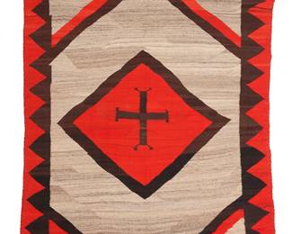 3217
A Navajo Ganado rug
Late 19th/early 20th century, Diné
With a Spider Woman motif within a central diamond and a serrated border, woven in natural grey, dark brown, and aniline red wool
75.5" H x 54" W
Estimate: $1,000 - $1,500