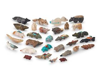 3410
A group of Southwest Pueblo carved stone fox & badger fetish figures
Mid/late 20th century, mostly Zuni Pueblo
Eleven labeled for artist; one marked: Lasiloo
A group of carved stone figures, including foxes, badgers, bears, and other animals, in various sizes and various stones and materials including turquoise, pipestone, onyx, shell, spiny oyster, and other green, pink and grey hardstones, including ten figures by Zuni artists including Nelson Yatsattie, Virginia Toombs, Reynold Lunasee, Travis Panteah, Tim Lementino, Pat Homer, Thelma Sheche, and Jessie Le Boeuf, as well as twenty further figures, most with mounted offerings
30 pieces
Largest: 1" H x 0.875" W x 3.75" D; Smallest: 0.5" H x 0.25" W x 1.375" D
Estimate: $200 - $400
