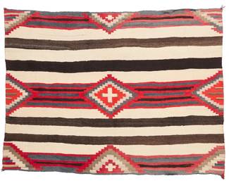 3195
A Navajo Third Phase Transitional wearing blanket
Late 19th century, Diné
With alternating bands and stepped diamonds, woven in dark brown, cream, pale blue, and red handspun wool, with yellow and green Germantown wool accents
48.5" H x 62.5" W
Estimate: $2,000 - $4,000