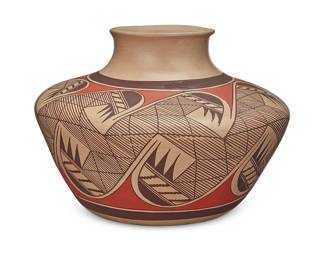 3340
Clinton Polacca Nampeyo (1958-2022, Hopi-Tewa)
A polychrome pottery jar, late 20th century
Signed to underside: Clinton Polacca "Nampeyo"
The three-color jar with red and brown migration motif and fine-line work, on a cream slip ground, housed in a plate glass and wood, velvet-lined display case
Jar: 6.375" H x 9" Dia.; Case: 9.75" H x 14.25" W x 14.25" D
Estimate: $300 - $500