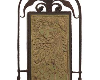 3080
A Bushere & Son wrought iron and tile wall hanging
Late 20th/early 21st century
Impressed verso: [cipher] SHERE & SON
The glazed ceramic tile depicting a peacock, set into a wrought iron frame
15.875" H x 10.5" W x 1.75" D
Estimate: $700 - $900