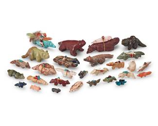 3414
A group of Southwest Pueblo carved stone animal fetish figures
Mid/late 20th century, mostly Zuni Pueblo
Nine labeled for artist; one marked: Yatsattie; two with unknown marks; one labeled: Carmella Snow
A group of carved stone figures, including foxes, badgers, bears, squirrels, and other animals, in various sizes and various stones and materials including turquoise, pipestone, lapis lazuli, shell, and other green, pink and grey hardstones, including figures by Zuni and Navajo/Diné artists including Louise Singer, Thelma Sheche, and Jayne Quam, as well as twenty further figures, most with mounted offerings
29 pieces
Largest: 1.5" H x 2" W x 4.25" D; Smallest: 0.5" H x 0.25" W x 1" D
Estimate: $200 - $400