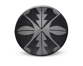 3299
Maria & Santana Martinez (1887-1980 & 1909-2002, San Ildefonso Pueblo)
A blackware pottery small dish, mid/late 20th century
Incised to underside: Marie + Santana
With black on black geometric designs
1" H x 5.75" Dia.
Estimate: $700 - $900