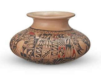 3341
Antoinette Silas Honie (b. 20th century, Hopi-Tewa)
A polychrome pottery low olla jar, late 20th century
Signed to underside: Antoinette Honie / Tewa Hopi
The three-color jar with black and red geometric and avian motifs on a cream slip ground
5.875" H x 9.5" Dia.
Estimate: $500 - $700