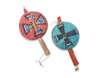 3274
Two early Hopi Pueblo polychrome dance rattles
Early 20th century; Southwest United States
The double-sided painted gourd rattles, each mounted on a carved wood handle, comprising one in blue and black with fringed cross motif and a red handle, and the other in red with a blue and yellow flared cross motif
2 pieces
Each: 9.25" H x 5" Dia. & 4.75" Dia.
Estimate: $400 - $600
