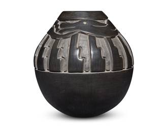 3306
Phyllis & Marlin Hemlock (b. 20th century, Santa Clara Pueblo/Seneca Iroquois)
A carved blackware pottery vessel, late 20th century
Incised to underside: Phyllis + Marlin / Hemlock / Santa Clara
With deeply carved Avanyu motif above stepped bands
7.25" H x 6.875" Dia.
Estimate: $200 - $400