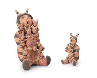 3415
Emily "Corn Pollen" Fragua Tsosie (b. 1951, Jemez Pueblo)
Two Jemez Pueblo polychrome slip-glazed pottery storytellers, late 20th century
Each signed variably to underside: E. Fragua Tsosie / E. Tsosie / Jemez
Each a Koshare clown Hopi-style figure, the larger with seven Koshare children and a painted pottery vessel and the smaller holding a single child
2 pieces
Larger: 9.5" H x 5.5" W x 6.5" D; Smaller: 5" H x 3" W x 3.5" D00
Estimate: $300 - $500