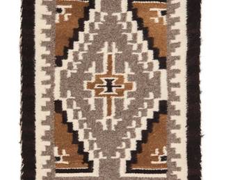 3236
An Annie Watchman Navajo Two Grey Hills weaving
Annie Mae Watchman (1932-2001, Diné)
Late 20th century
Woven in cream, brown, grey, and black wool with stepped diamond to center
22.5" H x 14.5" W
Estimate: $200 - $400