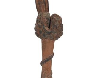 3173
A Folk Art wood carving of an eagle and snake
19th/20th century
The partially painted carving depicting an eagle perched atop a tree or bush with an approaching snake coiled around
27.125" H x 7.25" W x 5" D
Estimate: $400 - $600