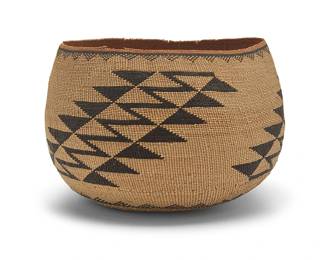 3292
A polychrome Hupa/Yurok/Karuk basket
Mid/late 20th century; Northern California
The tall twined bowl with diagonal imbricated sawtooth and zigzag geometric motifs and triangular banding to rim and base
5.5" H x 8.5" W x 8" D
Estimate: $400 - $600