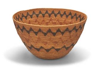 3290
A large polychrome Mission basketry bowl
Early 20th century; Southern California
A coiled extra-large tapered mush bowl style basket with three zigzag bands to body
10.75" H x 18" Dia.
Estimate: $800 - $1,200