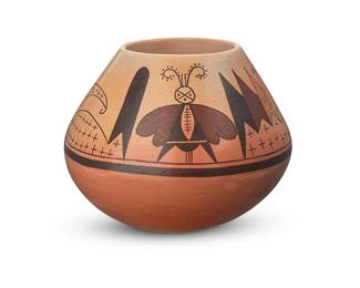 3334
Mark Tahbo (1958-2017, Hopi-Tewa)
A polychrome yellowware pottery jar, 1989
Signed and dated to underside: Mark Tahbo / Tewa . Hopi / 89
The three-color jar with brown and dark brown moth figures and stars within wave motifs to shoulder, on a cream slip ground
4" H x 5.125" Dia.
Estimate: $300 - $500