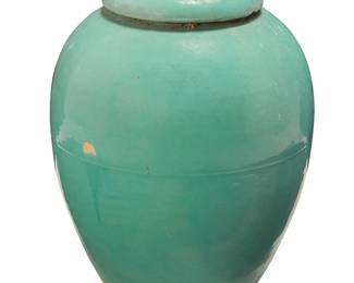 3087
A Bauer pottery oil jar
Early/mid-20th century
Unmarked
The pale green-glazed jar with thick flared rim
21.5" H x 17" Dia.
Estimate: $600 - $800
