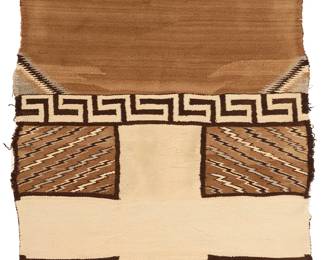 3209
A Navajo double saddle blanket
Early 20th century, Diné
Woven in brown, tan, cream, and grey wool with one end featuring a cross motif and four rectangles with diagonal sawtooth bands, and the other end with bands of terraced fret motifs and sawtooth corners
52" H x 34" W
Estimate: $500 - $700
