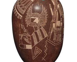 3331
Lawrence Namoki (1949-2020, Hopi-Tewa)
"Rainmakers"
Sgraffito pottery vessel and inlaid turquoise
Incised signature and title to underside: Lawrence Namoki / Hopi
5.625" H x 4" Dia.
Estimate: $200 - $400