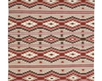 3273
A Louise Mike Navajo Crystal rug
Louise Mike (b. 20th century, Diné)
Late 20th century
Woven in brown, pink, red, grey, and cream wool with alternating bands of conjoined sawtooth diamonds and striped and twill banding
59" H x 45" W approximately
Estimate: $500 - $700