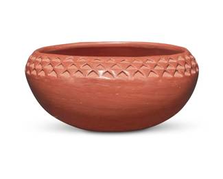 3345
Garnet Pavatea (1915-1981, Hopi-Tewa)
A redware pottery bowl, mid-20th century
Signed to underside: Garnet Pavatea
The oval bowl with notched banding
3.125" H x 7.125" W x 6.125" D
Estimate: $300 - $500