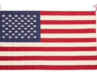 3176
A Bertha Harvey Navajo US flag pictorial weaving
Bertha Harvey (b. 1955, Diné)
Late 20th century
Woven in red, cream, and blue wool
57.5" H x 34.5" W
Estimate: $600 - $900