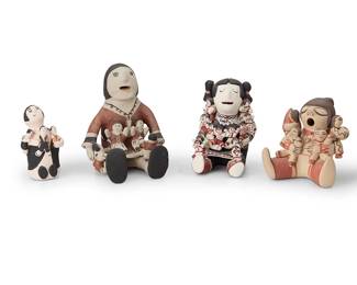 3418
A group of Southwest Pueblo pottery storytellers
Late 20th/21st century
Two variously signed to base: MQ / [illegible] Cochiti N.M.
Four polychrome pottery storytellers in red, black and white in various styles, including one with fourteen children, two with four children, and a small hollow figure with three children
4 pieces
Largest: 6.5" H x 5.5" W x 5.75" D; Smallest: 4.5" H x 2.5" W x 2.5" D
Estimate: $200 - $400