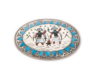 3376
A Benson Boyd Navajo sterling silver and stone inlay storyteller belt buckle
Benson Boyd (b. 20th century, Diné)
Mid/late 20th century
Stamped: BB
An oval buckle with turquoise, coral and shell inlay, depicting Gan dancers in a starry landscape
2.75" H x 3.75" W
51.5 grams gross
Estimate: $250 - $350