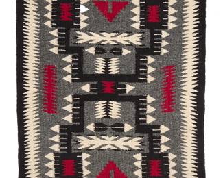 3268
A Nancy Beyale Navajo storm pattern weaving
Nancy Beyale (b. 20th century, Diné)
Mid/late 20th century
Woven in gray, red, black, and cream wool with storm lightning and feather motifs, and a sawtooth border to sides
24" H x 19" W
Estimate: $200 - $400