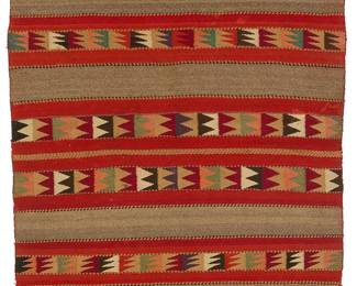 3200
A Navajo banded twill child's blanket
Late 19th century, Diné
Elaborately woven in red, green, pink, brown, cream, purple, orange and black wool featuring various serrated, zigzag, ticked, and solid color twill banding, with narrow banded ends
32" H x 49.75" W
Estimate: $4,000 - $6,000
