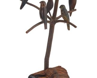 3174
A Folk Art carved wood bird figural group
19th century
Comprising five painted carved wood birds mounted to a natural wood "tree" set into a natural wood base
20.25" H x 15" W x 11.5" D
Estimate: $300 - $500