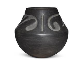 3304
Rose Gonzales (1900-1989, San Ildefonso Pueblo)
A blackware pottery jar, mid-20th century
Incised to underside: Rose
With carved wave and stepped motifs to shoulder
7" H x 7.75" Dia.
Estimate: $300 - $500